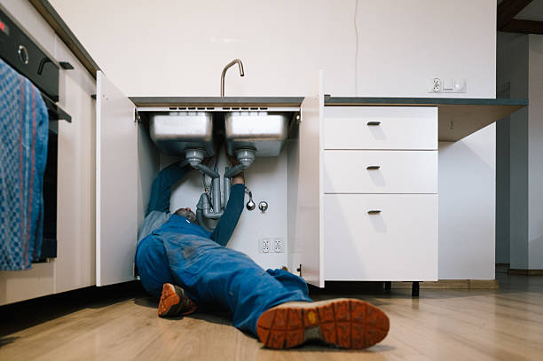 Professional Plumbing technician working in Totz, KY